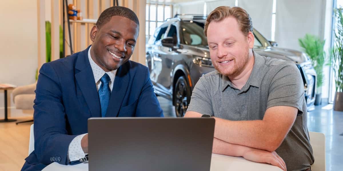 Employee and Customer at Desk