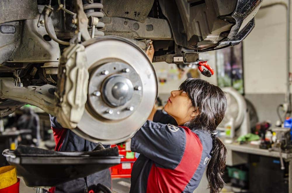 mechanic working on car