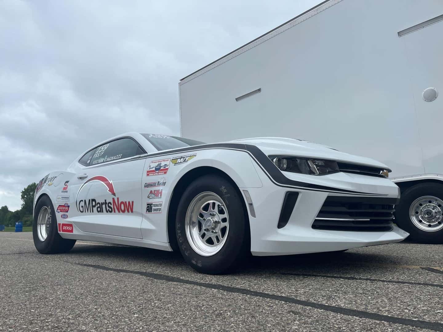 White COPO Camaro at the track