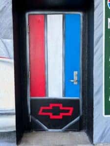 Close up of the painted Camaro logo in Berger's mural