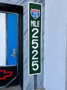Close up of the painted mile marker in Berger's mural