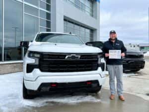 Dustin with his Employee Spotlight Certificate