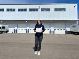 Ally Wenzel with her Employee Spotlight Certificate