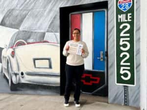 Nicole with her Employee Spotlight certificate