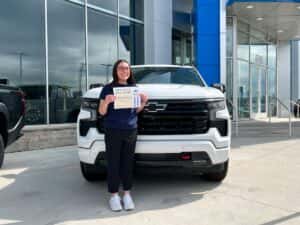 Morgan with her Employee Spotlight Certificate