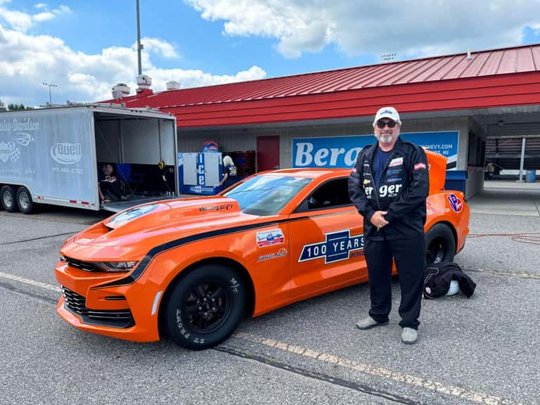COPO Camaro rider in front of the car