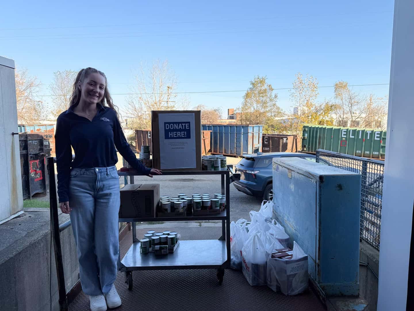 Berger employee with donated food