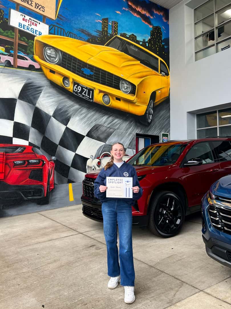 Katie with her Employee Spotlight certificate