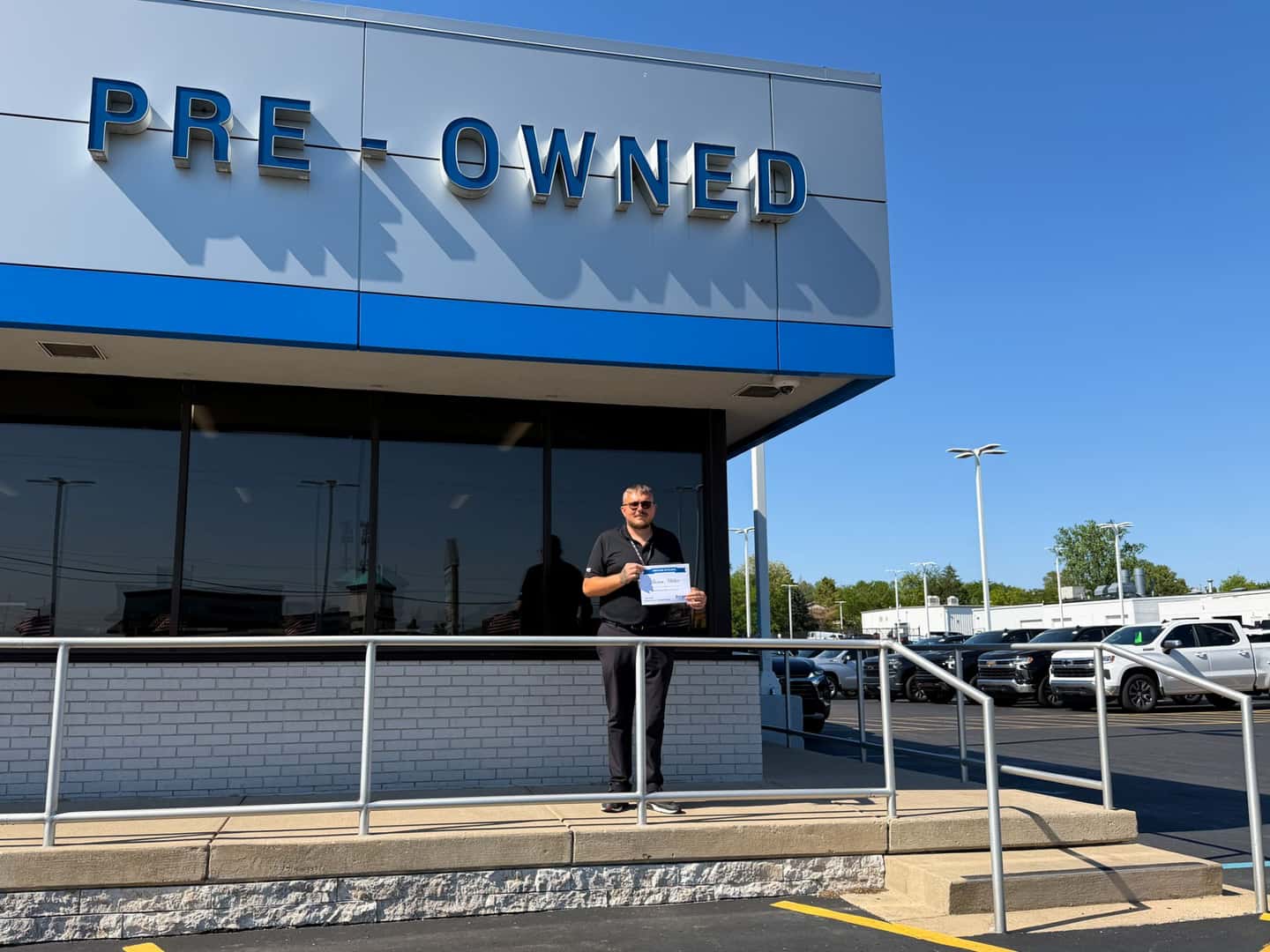 Jason Miller with his Employee Spotlight Certificate