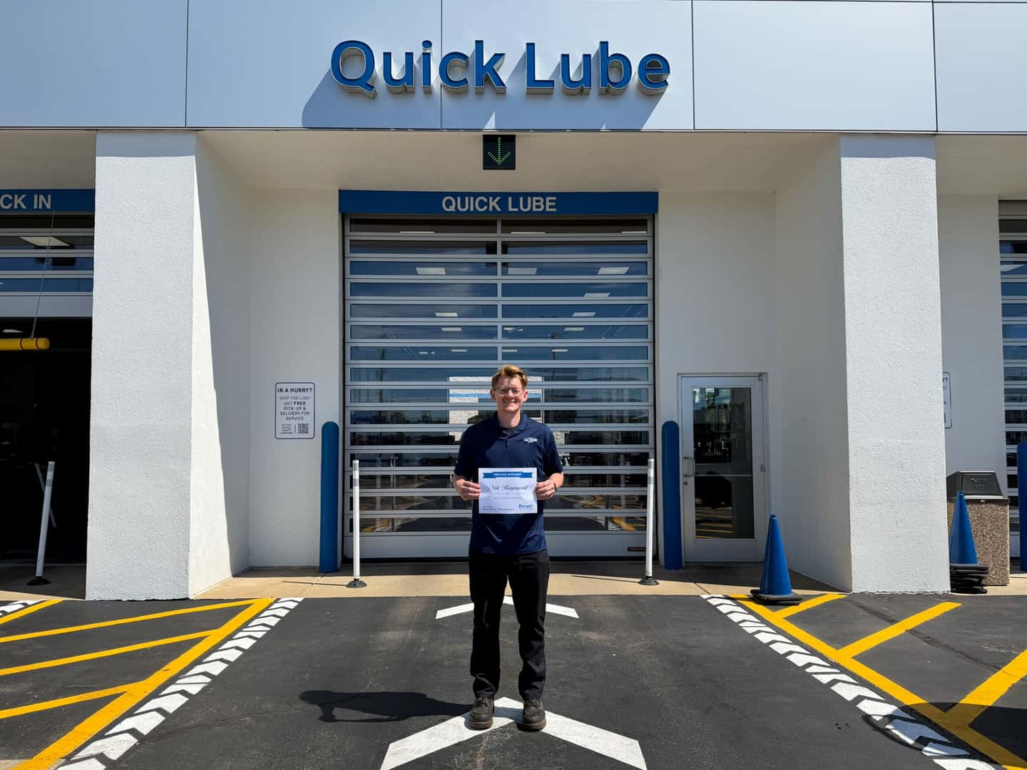 Nik with his Employee Spotlight Certificate