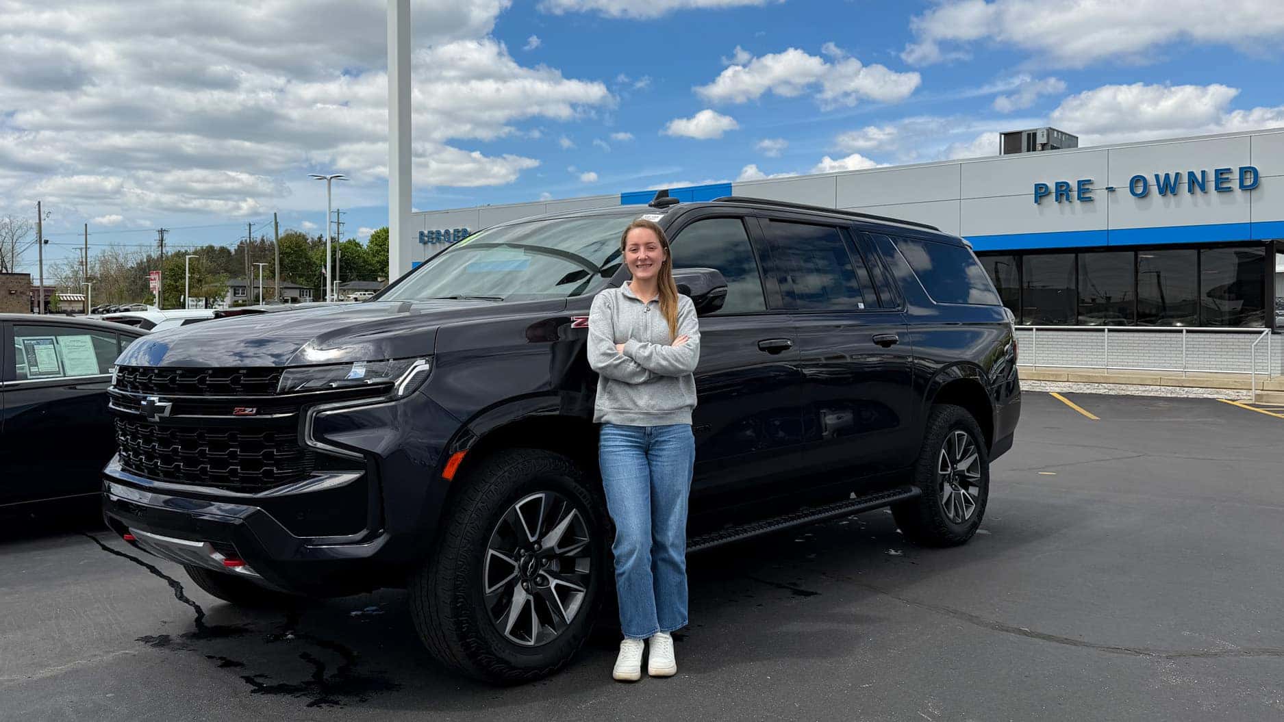 Woman with Pre-Owned Suburban Z71