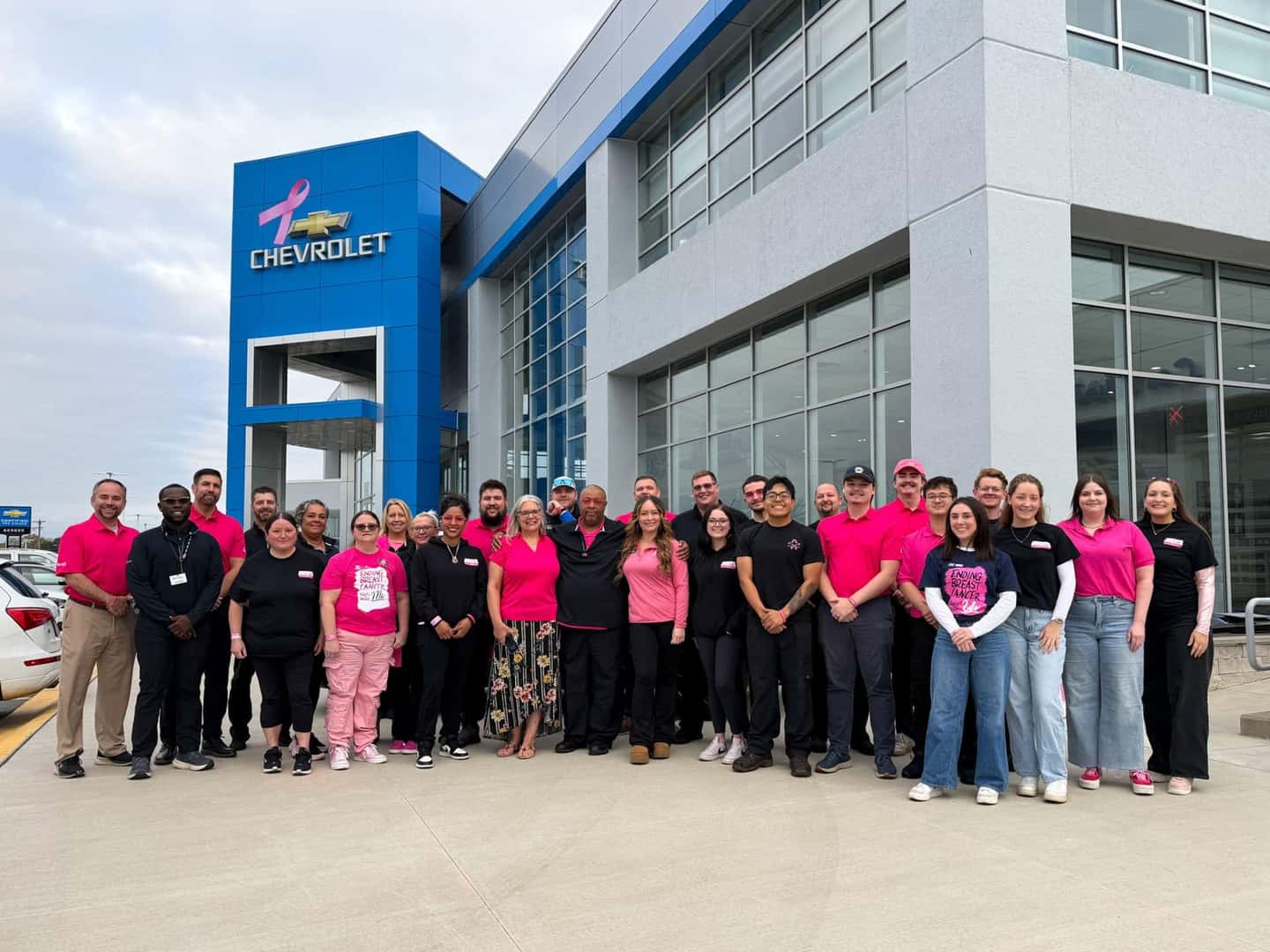 Berger Team Photo in breast cancer awareness apparel