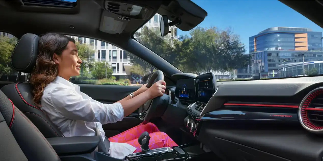 Driver at the wheel of a Chevrolet Trax looking toward the road ahead