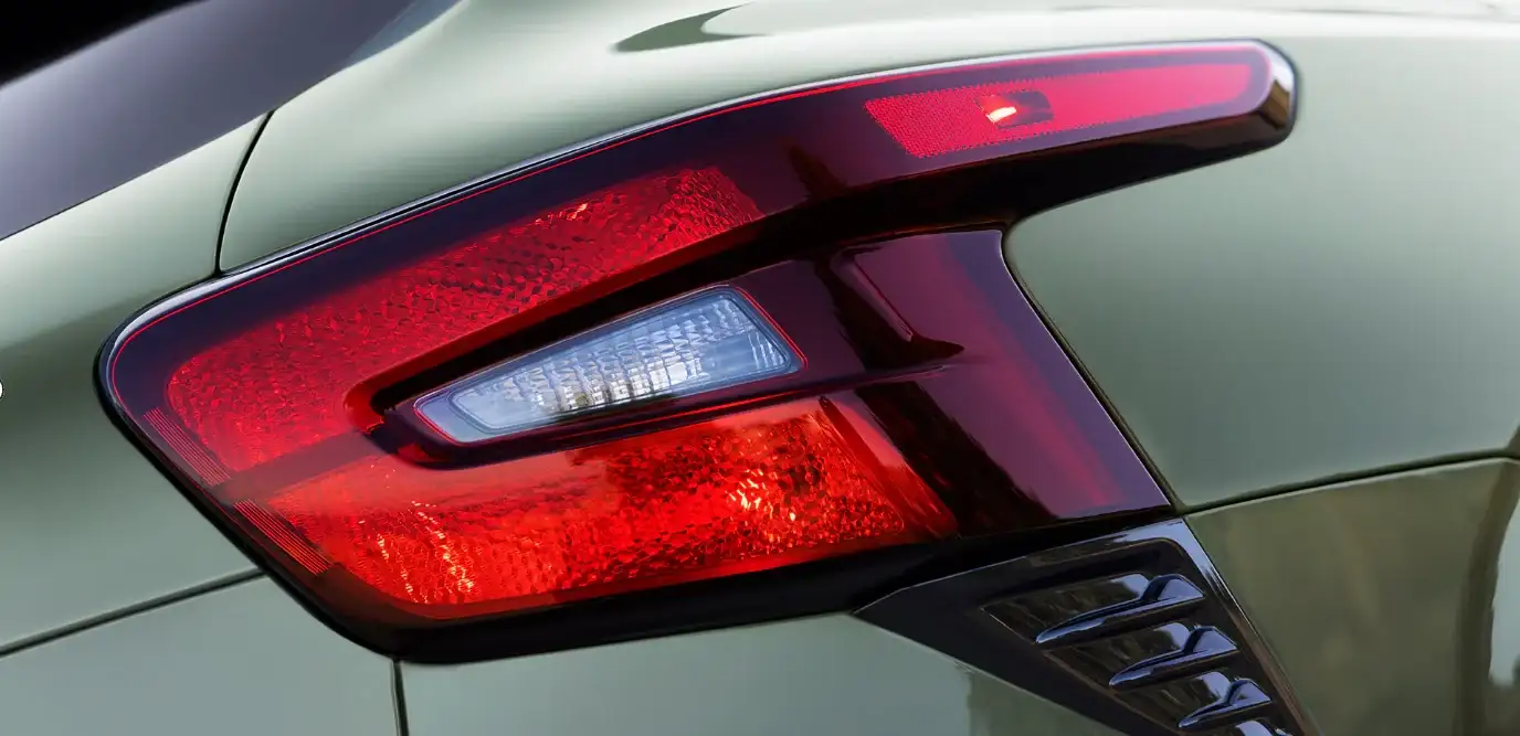 Close-up of the Chevrolet Trax tail lamp on a sage green body