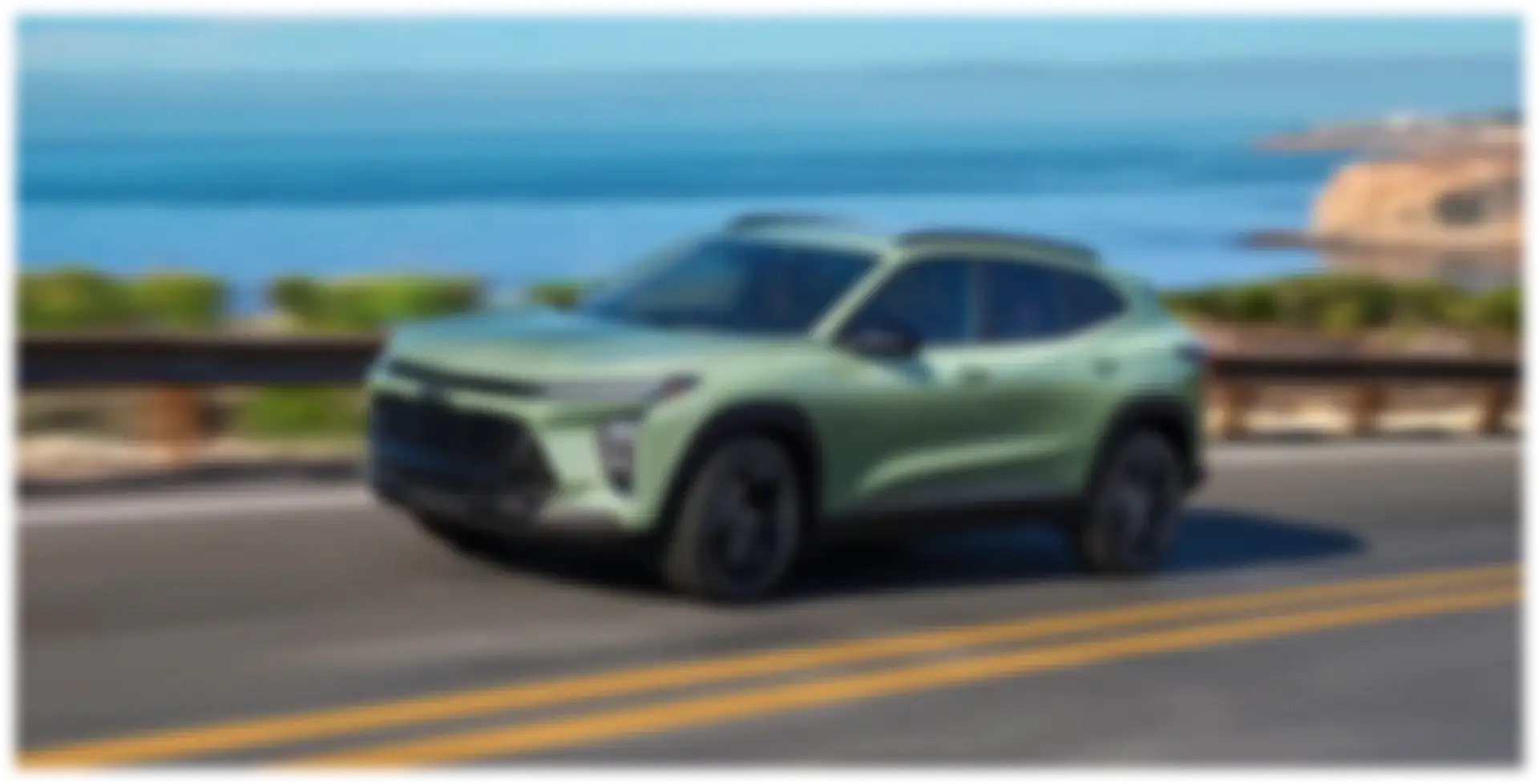 2026 Chevrolet Trax driving along a coastal highway