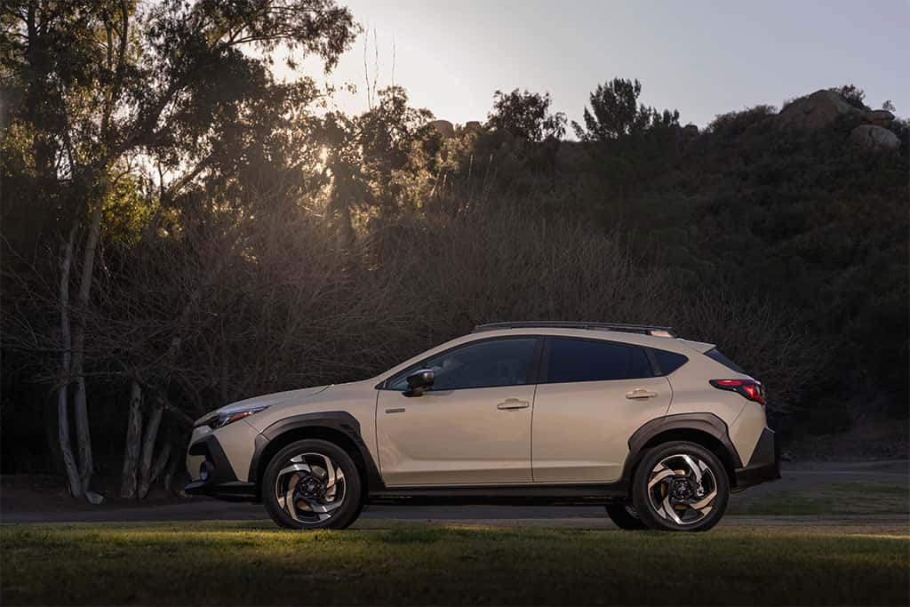 2026 Subaru Crosstrek Hybrid sand dune pearl color parked showing left side