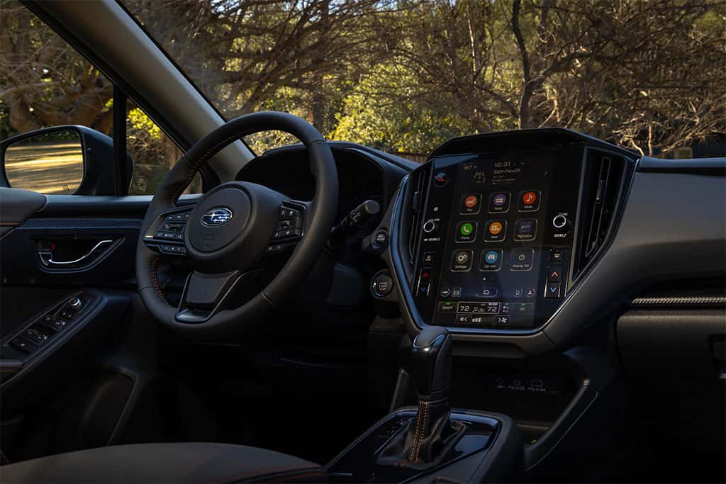 2026 Subaru Crosstrek Hybrid interior showing off seating and infotainment console