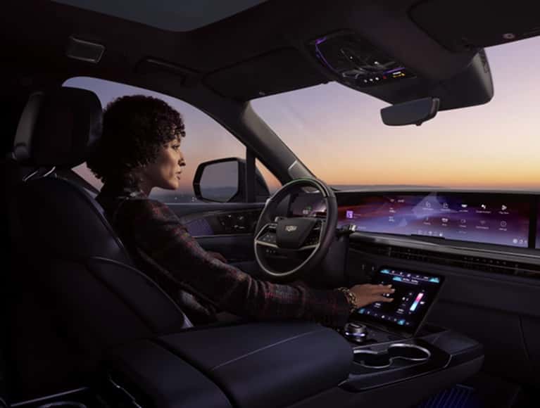 Woman in her Cadillac