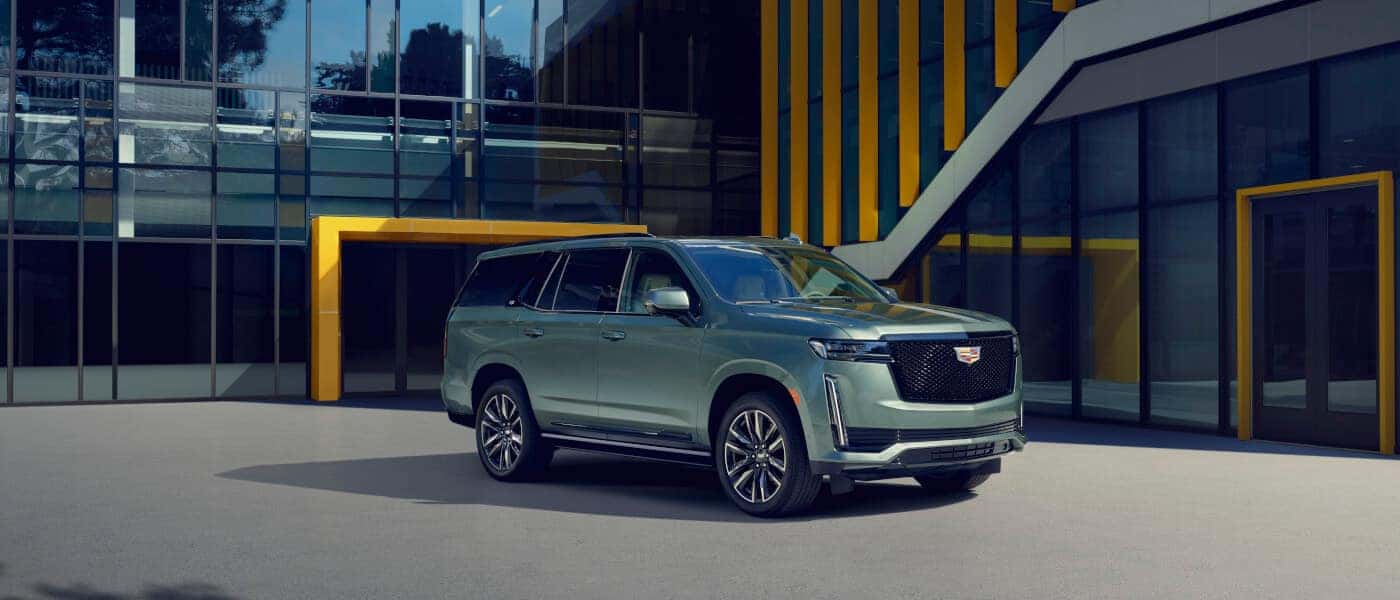 2024 Cadillac Escalade parked by an office building