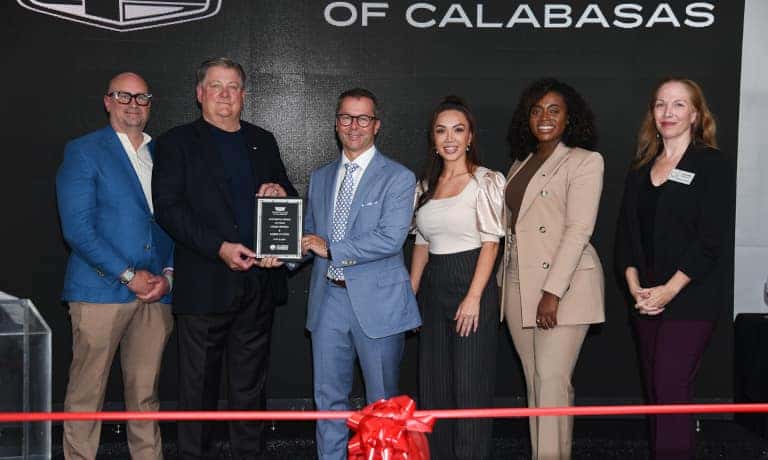 Speakers with award at the Grand Reopening