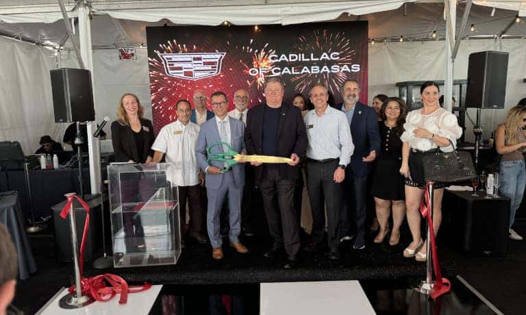 After cutting the ribbon at the Cadillac of Calabasas Grand Reopening ribbon ceremony