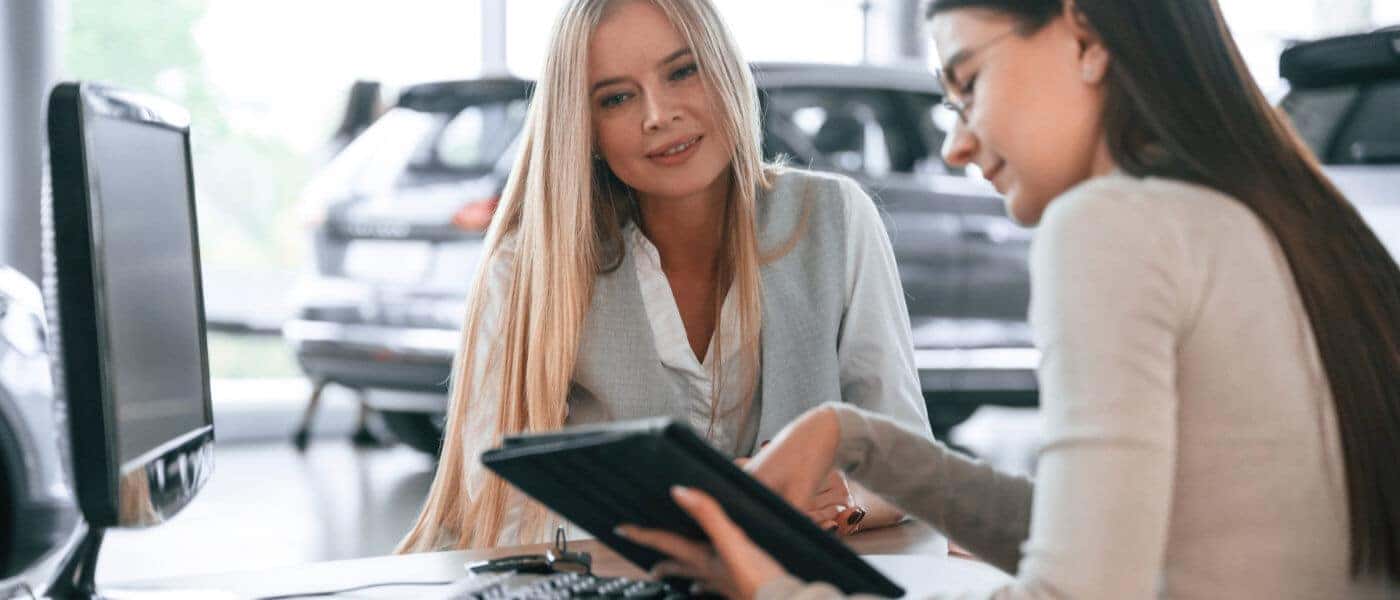 Women going over contract