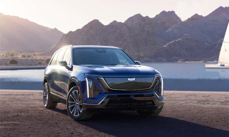 2026 Cadillac VISTIQ parked by sailboats