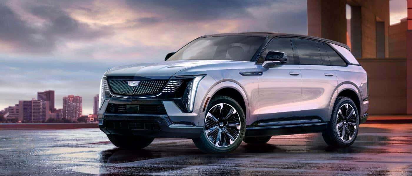 2025 Cadillac Escalade IQ in front of city skyline