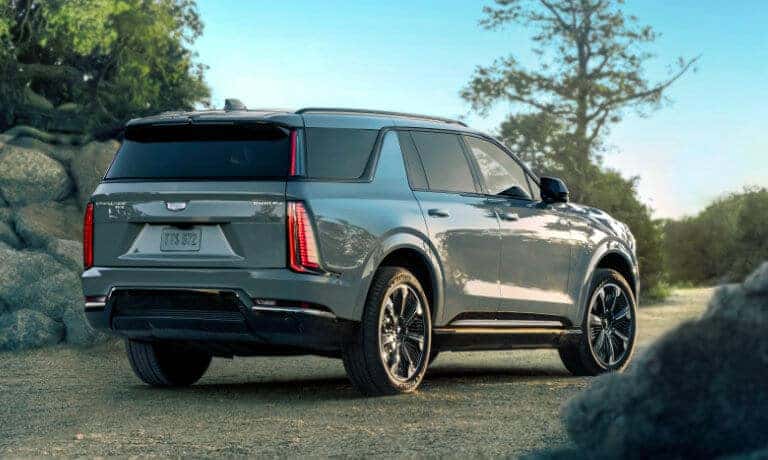 2026 Cadillac ESCALADE IQL rear view on trail