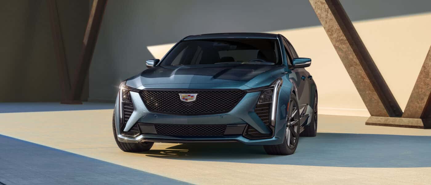 2026 Cadillac CT5 parked in front of concrete building