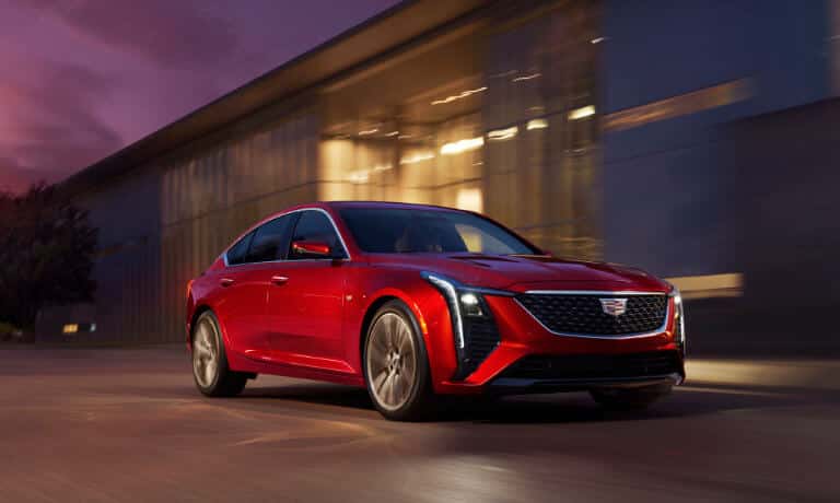 2026 Cadillac CT5 driving at dusk