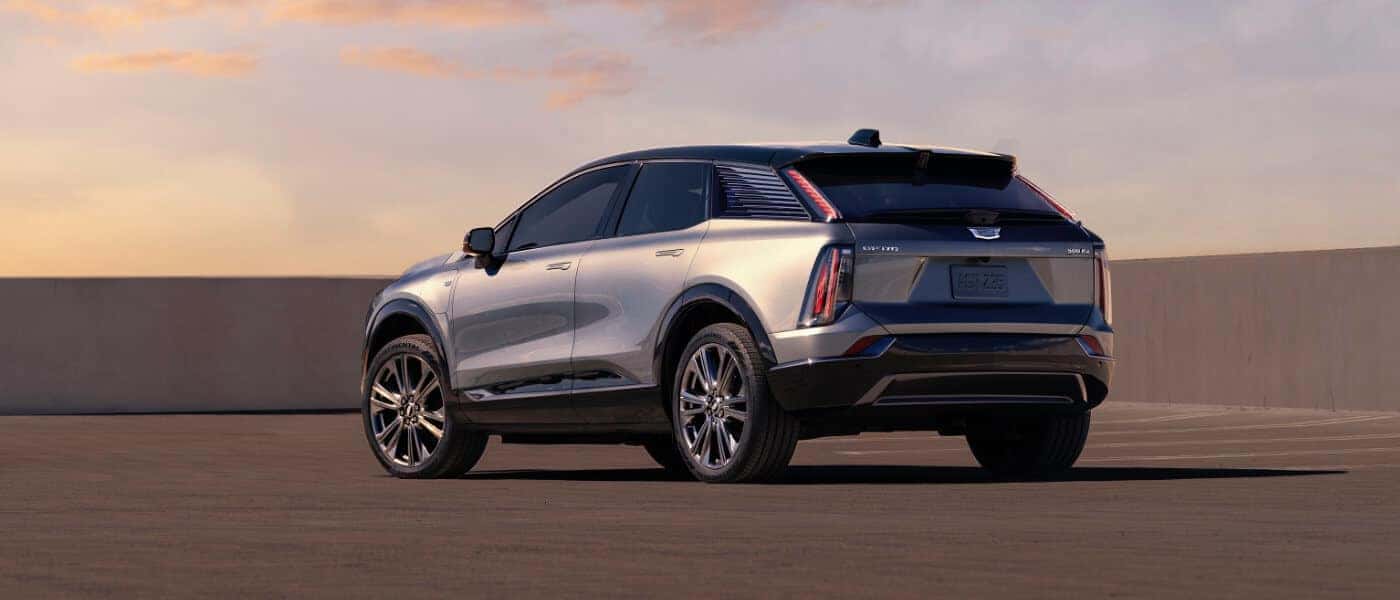 2027 Cadillac OPTIQ facing away at sunset