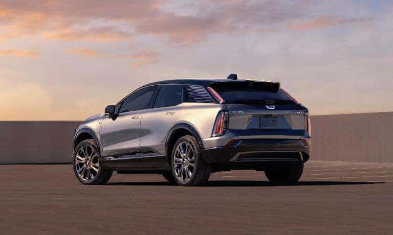 2027 Cadillac OPTIQ facing away at sunset