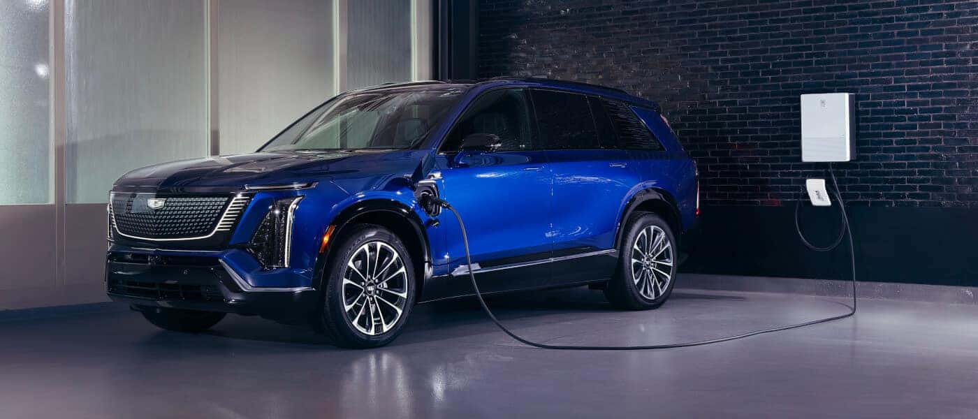 2026Cadillac-VISTIQ-ExteriorChargingInGarage