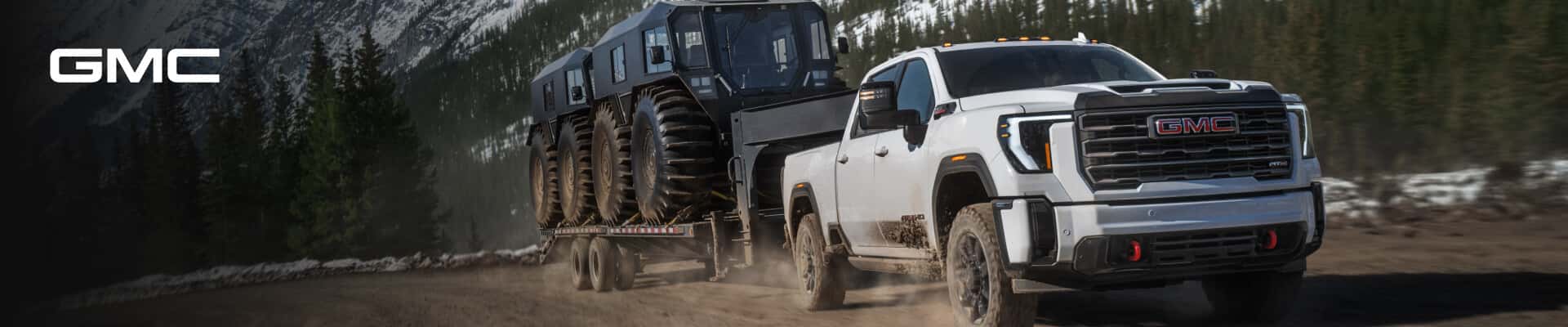 White GMC Truck Towing Utility Vehicles
