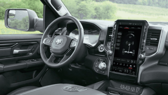 Ram 1500 interior showing the available 14.5-inch Uconnect 5 touchscreen