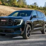 A 2026 GMC Acadia on the road