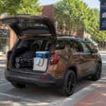 2026 GMC Terrain with liftgate open on a downtown Rockingham NC street near a children's museum