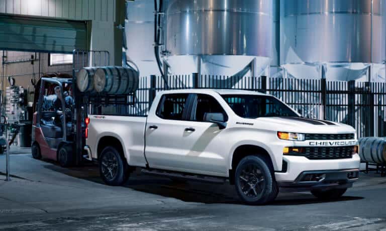 2026 Chevy Silverado 1500 with barrels loaded into bed