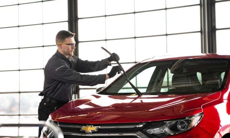 Technician Lifting Window Wiper