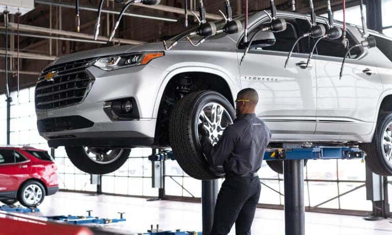 Technician Removing Tire