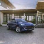 Front 3/4 view of the 2024 Buick Envista Avenir in Ocean Blue Metallic. Preproduction model shown. Actual production model may vary. Available in summer 2023.