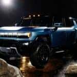 2024 GMC HUMMER EV Omega Edition SUV featuring exclusive Neptune Blue Matte exterior color and blacked-out accents.
