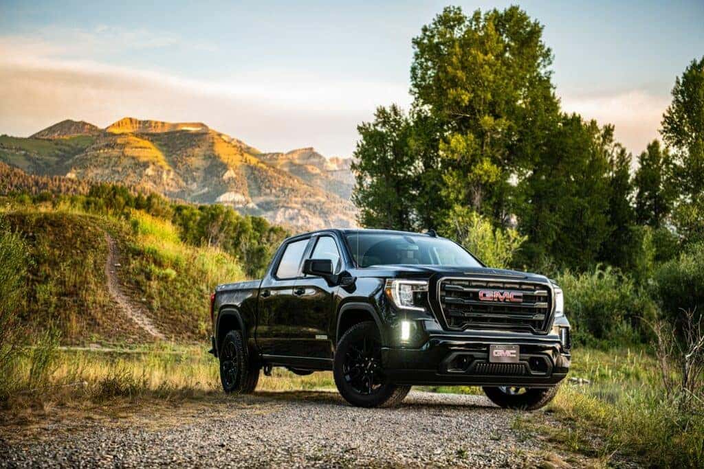 GMC Sierra 1500 Parked Front 3/4 View on a Mountain Trail