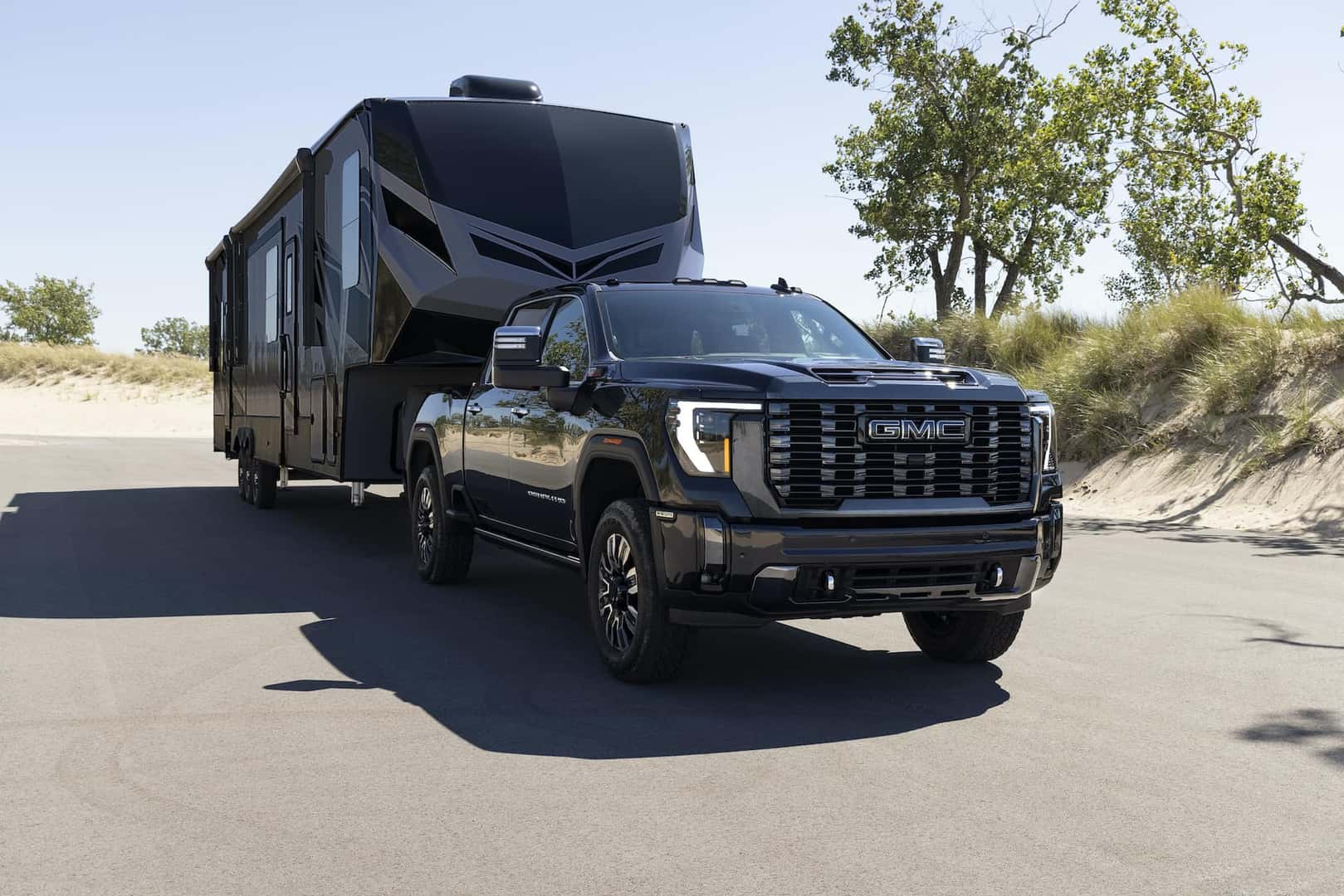 2024 GMC Sierra 2500 HD Denali Ultimate towing a trailer