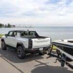 Interstellar White 2023 GMC Hummer towing