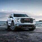 An Attractive 2024 GMC Acadia On A Serene Beach