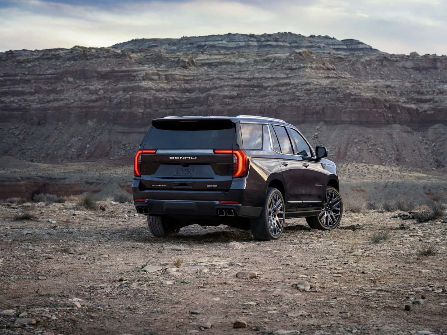 The Back View Of The Formidable 2025 GMC Yukon Denali Ultimate