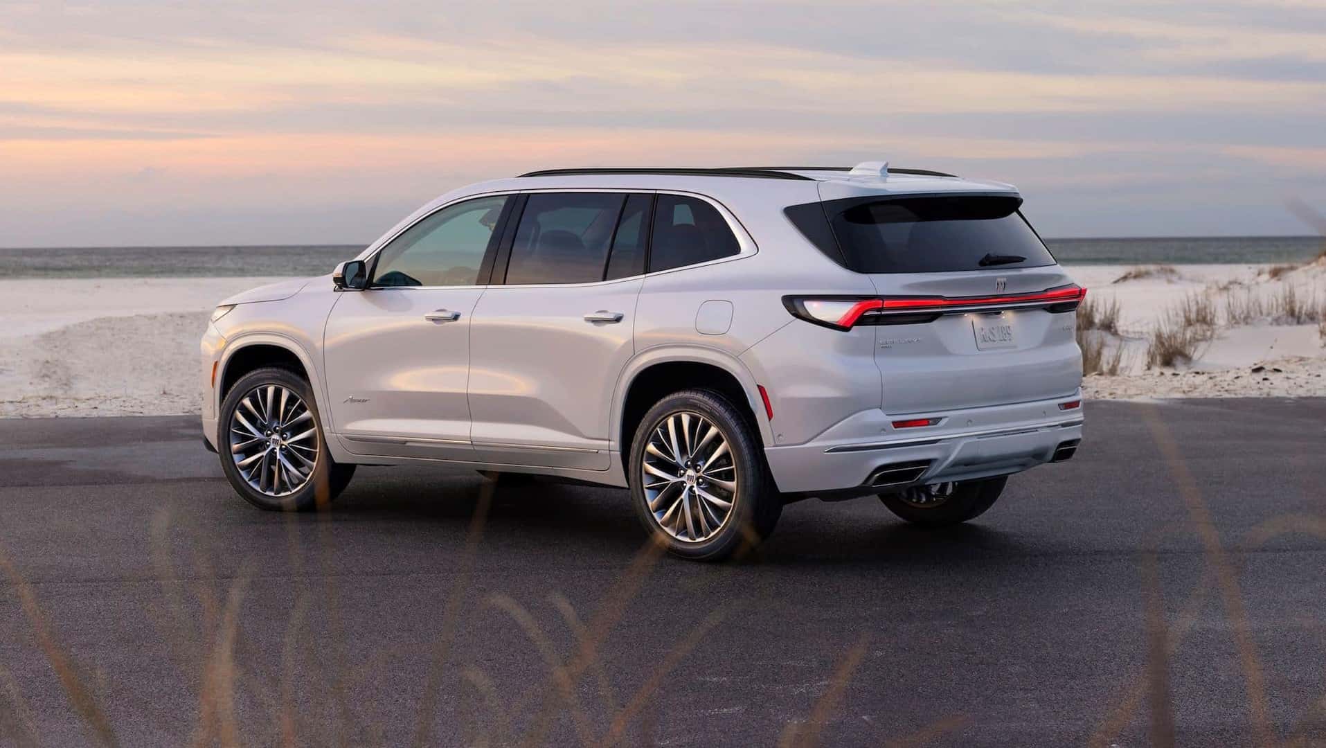 The Fashionable Back Exterior Of The Luxurious, Technologically Advanced, And Spacious 2025 Buick Enclave Avenir