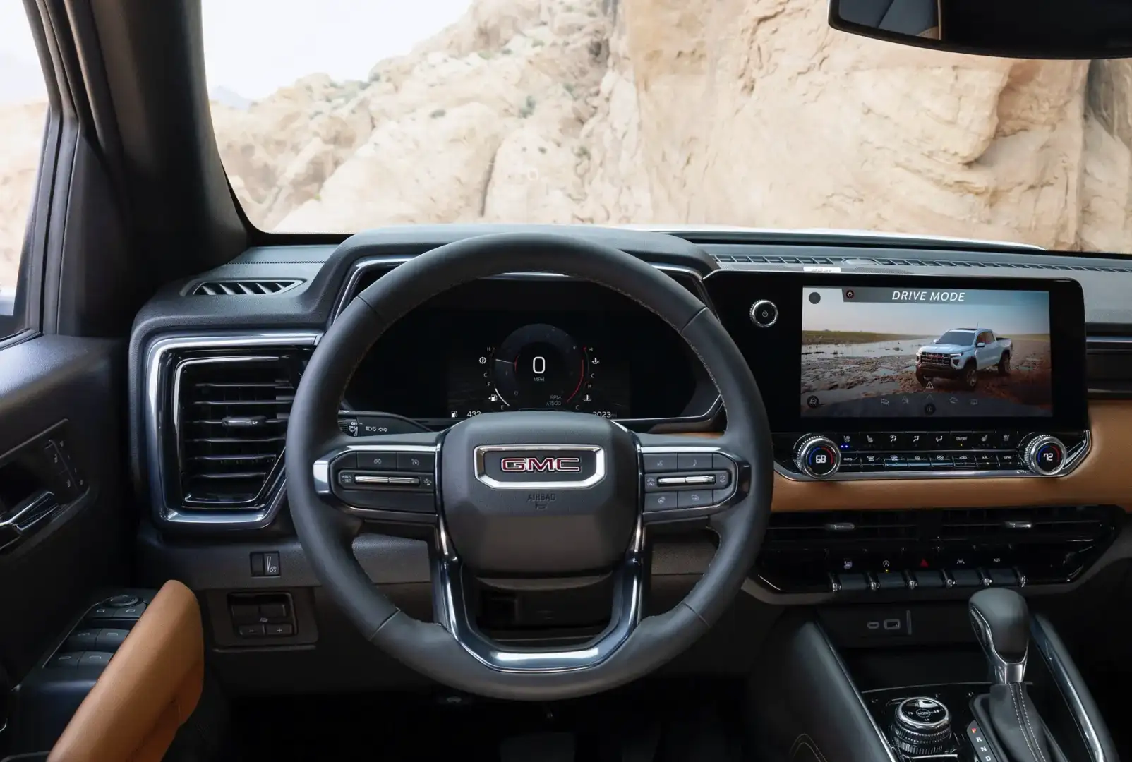 Interior view of the driver seat looking a the Wheel and Infotainment center